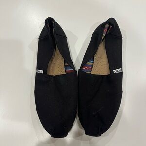 TOMS Black Canvas Slip-Ons